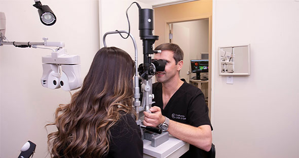 Dr. Barnett giving eye exams