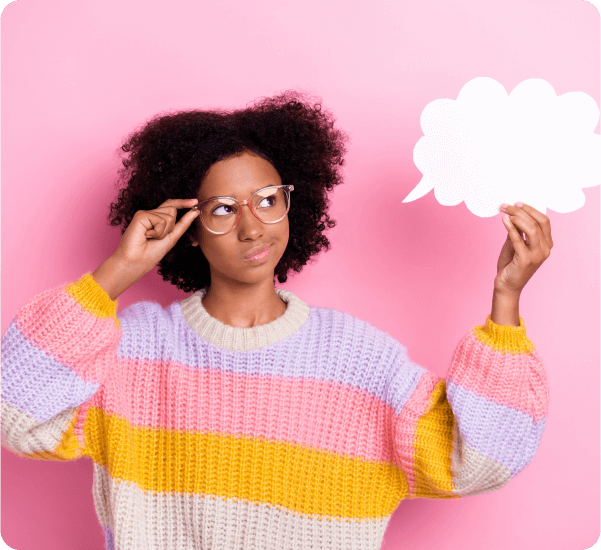 Woman wearing glasses holding a cloud cut-out