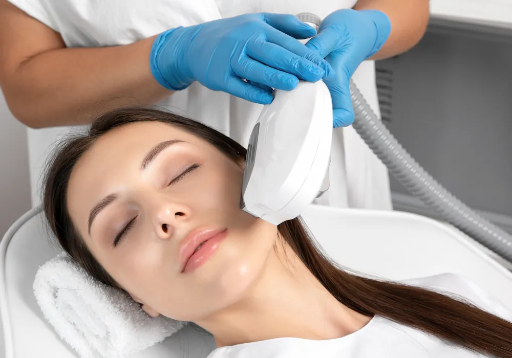 woman receiving co2 laser treatment on face